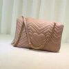 Bolsa GG Marmont medium matelassé Gucci - Loja Must Have