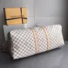 Mala de viagem KEEPALL BANDOULIÈRE Louis Vuitton - Loja Must Have