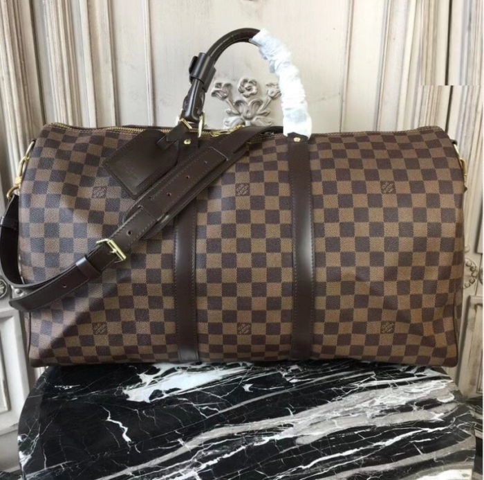 Products by Louis Vuitton: Keepall Bandoulière 55  Louis vuitton saco, Louis  vuitton keepall, Louis vuitton keepall 55